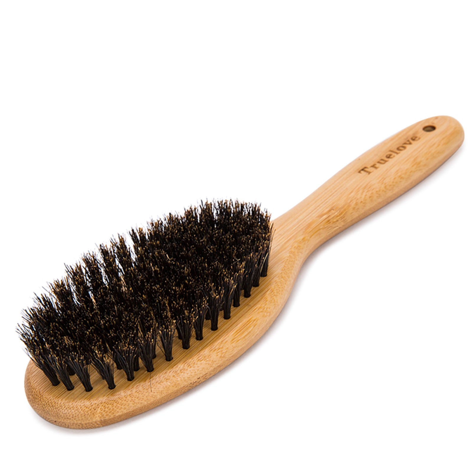 Bamboo brush with natural bristles displayed on a white background