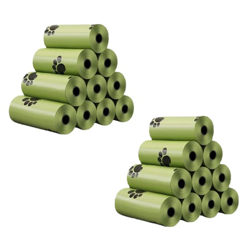 Set of 20 waste green plastic bags with paw print displayed on a white background.