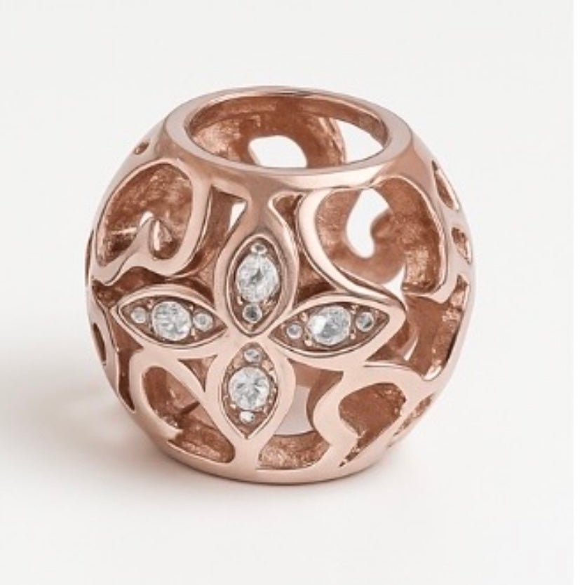 Memorial pendant for pet ashes made from stainless steel in rose gold colour; a beautiful way to honour your beloved pet.