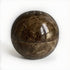 Brown stone incense burner displayed on a white background.