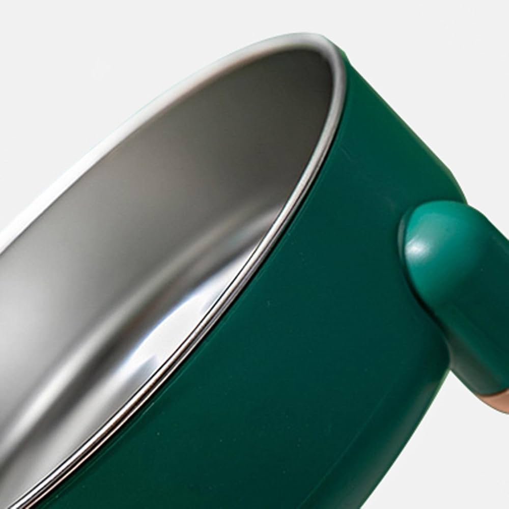 Close up of a green four-legged, non-slip cat bowl with a stainless steels insert.