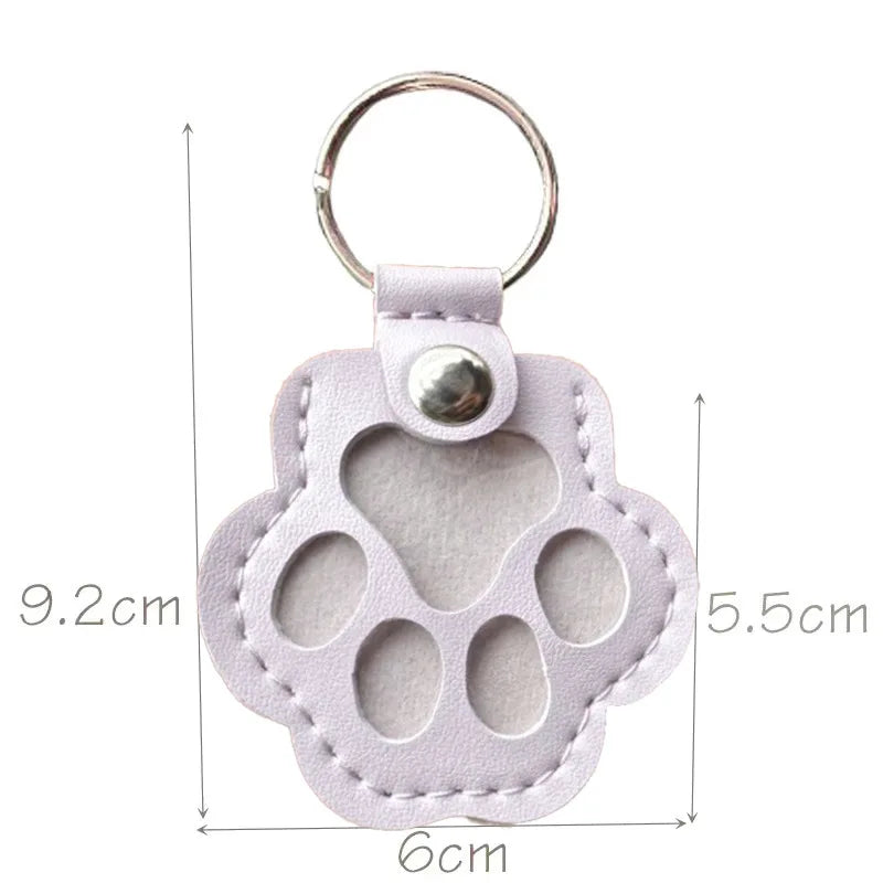 Lilac pet hair keepsake keyring with its measurements displayed on a white background.