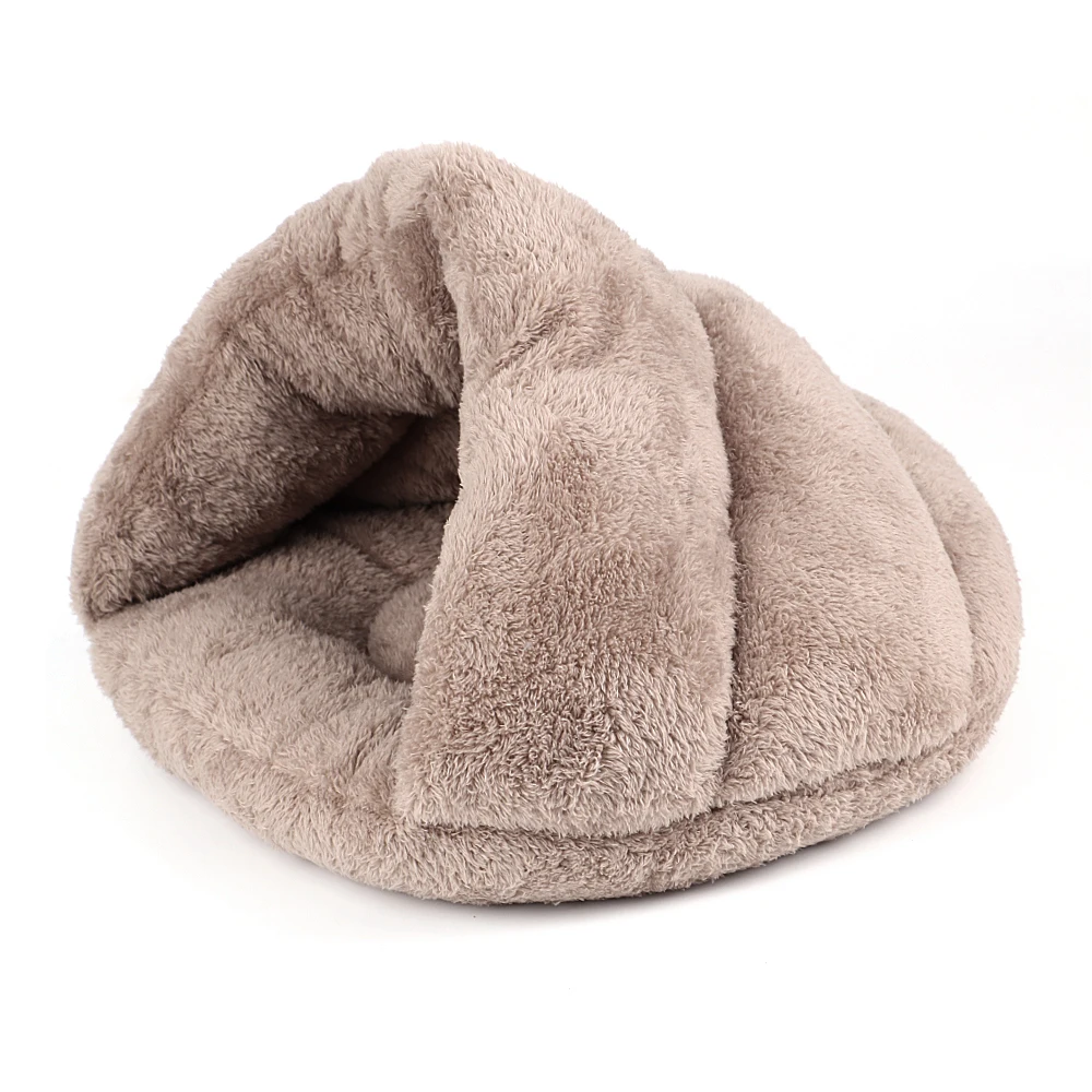 Beige plush igloo cat bed displayed on a white background.