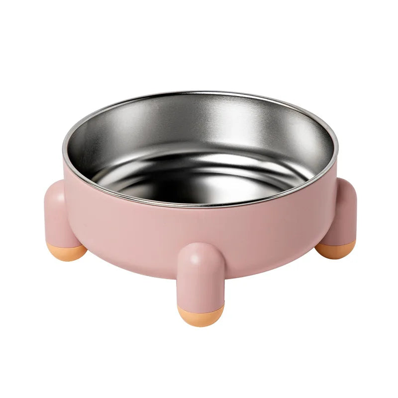 Pink four legged cat bowl with stainless steel insert, displayed on a white backgound.