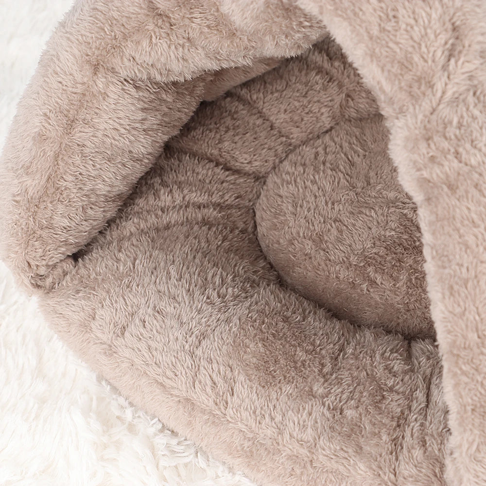 Entrance of ultra-soft plush cat bed in beige colour, a secure hideaway for anxious cats.