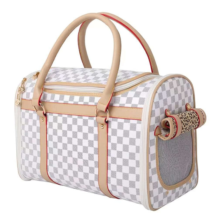 Pet carrier with checkered pattern and beige accents on a white background