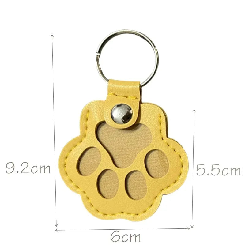 Yellow pet hair keepsake keyring with its measurements displayed on a white background.
