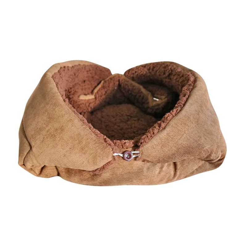 Brown cosy pet bed with a button on a white background