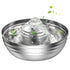 Stainless steel pet water fountain with water flowing and leaves on a white background