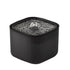 Black pet water fountain with water flowing on a white background