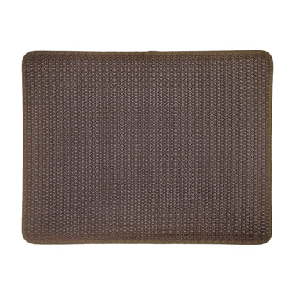 Brown cat litter trapping mat with honeycomb design displayed on a white background.