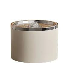 White ceramic cat water fountain with a silver rim displayed on a white background.