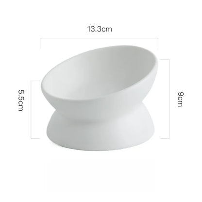 White ceramic elevated cat bowl displayed on a white background with measurements.