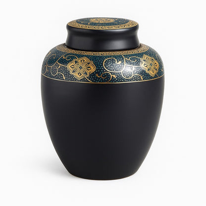 Ceramic black urn for pet ashes with a decorative motive. A beautiful keepsake to keep your pet close.
