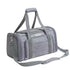 Grey pet carrier bag with shoulder strap on a white background