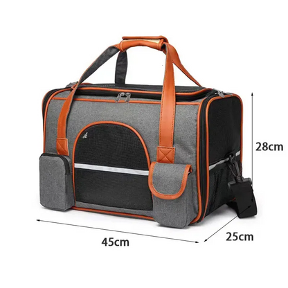 Soft foldable pet carrier with mesh windows in dark grey displayed on a white background.