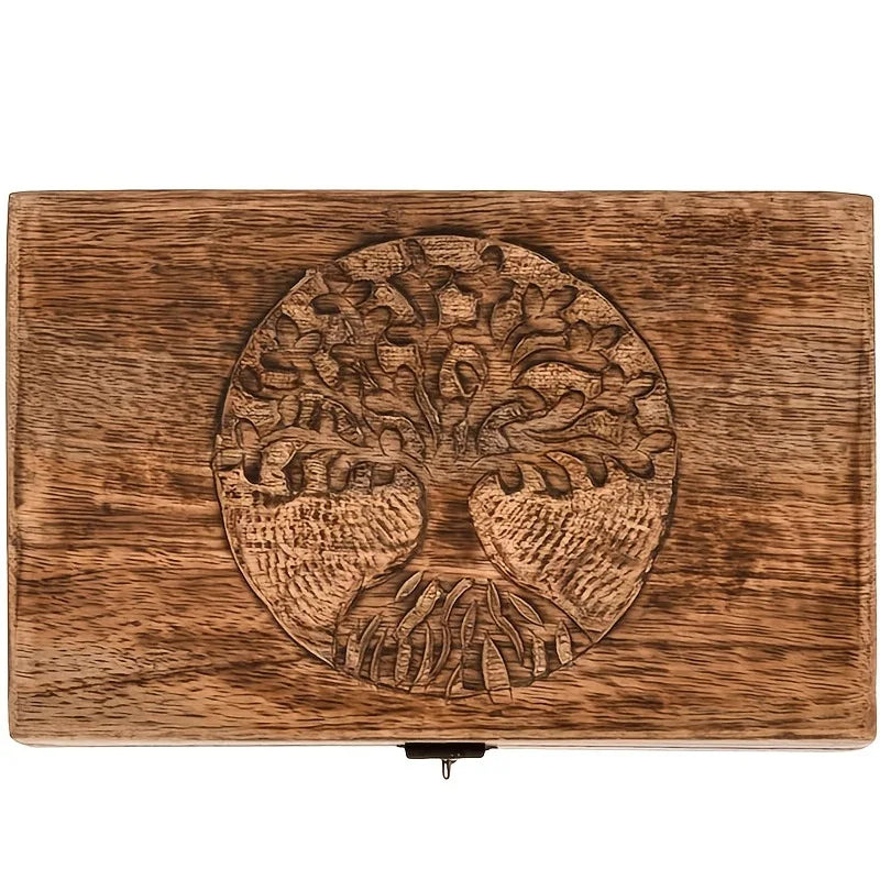 Wooden memorial box with engraved tree of life displayed on a white background.