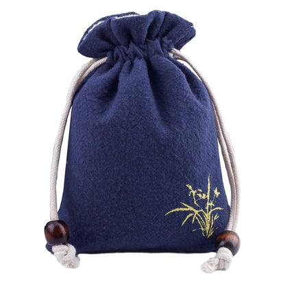 Dark blue velveteen pouch for pet ashes displayed on a white background.