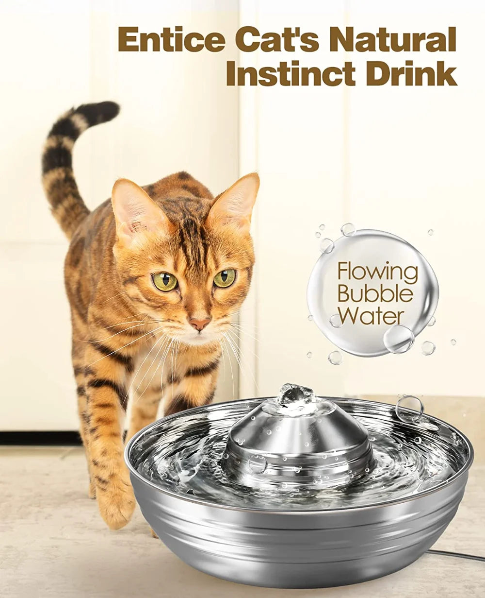 Cat drinking from a water fountain with text &