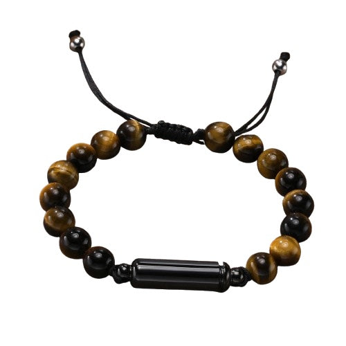 Tiger eye bead cremation urn bracelet with adjustable black cord and a cylindrical metal urn pendant in the centre, displayed on a white background.