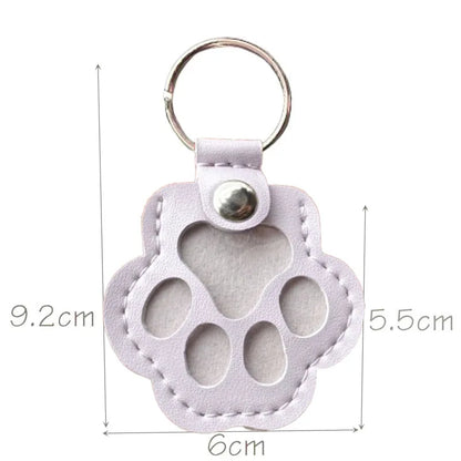 Lilac pet hair keepsake keyring with its measurements displayed on a white background.