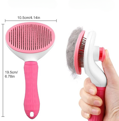 Pink cat grooming slicker brush shown with dimensions: 10.5 cm wide and 19.5 cm long. Includes close-up of cleaning future with fur.