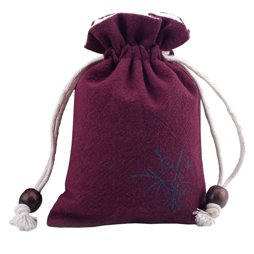 Purple velveteen keepsake pouch for pet ashes displayed on a whote background.