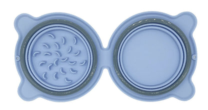 Blue silicone pet bowl with textured surface on a white background
