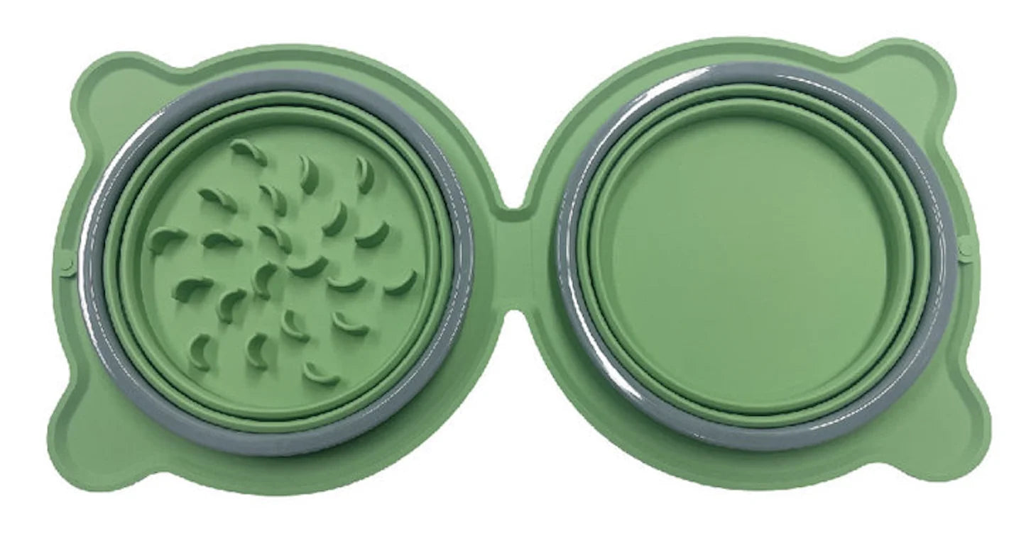 Green silicone pet bowl with textured surface on a white background