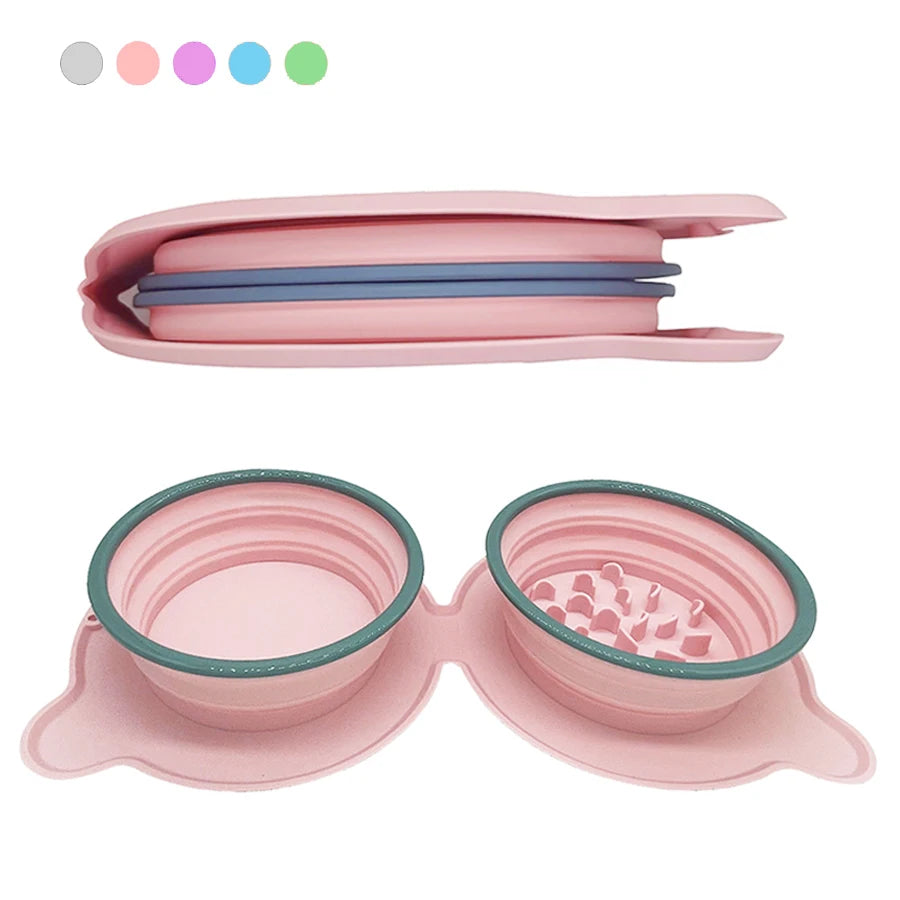 Pink silicone travel pet bowl with textured design and lid on a white background