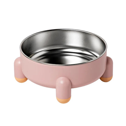 Pink four legged cat bowl with stainless steel insert, displayed on a white backgound. 