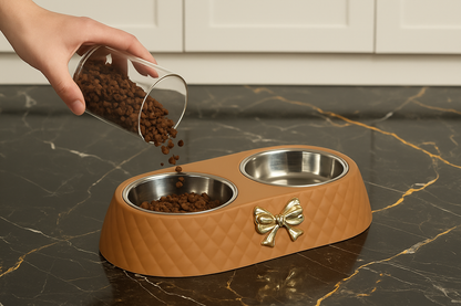 Stylish overhead shot of hand filling cat bowl on marble floor with white cupboards - square format